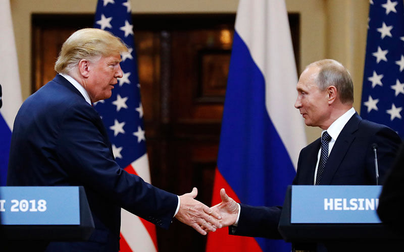 US president Donald Trump shakes hand with Russian president Vladimir Putin at the end of the press conference after their meeting at the Presidential Palace in Helsinki, Finland, Monday, 16 July, 2018.
