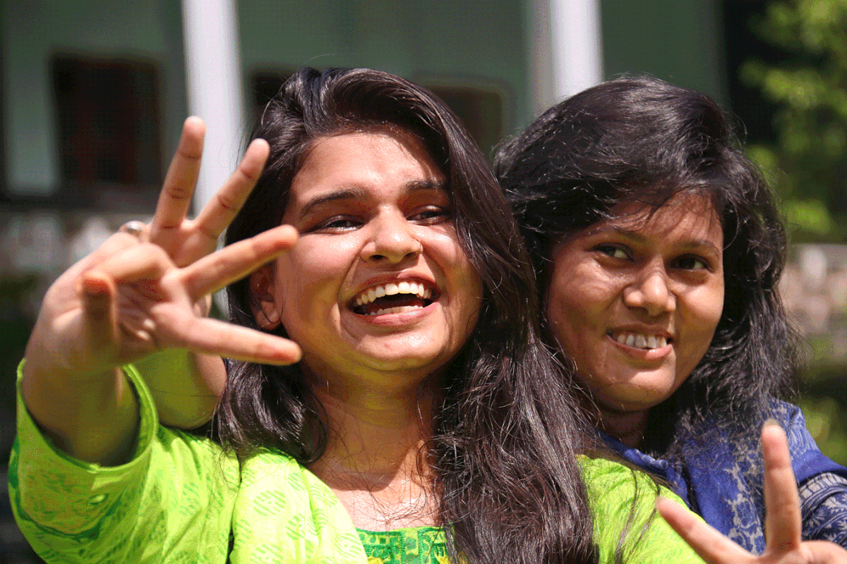 Two students of Sylhet Government Girls College celebrate their achievements. Photo: Anis Mahmud