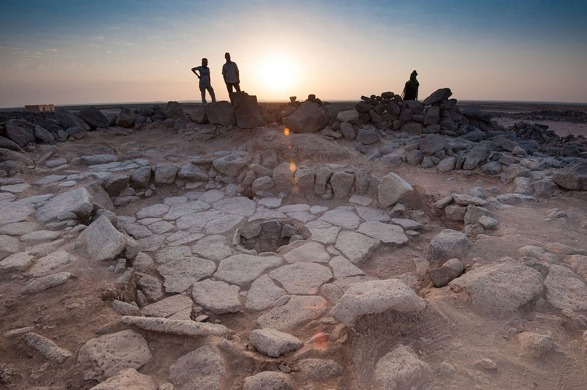 A stone structure at an archaeological site containing a fireplace, seen in the middle, where charred remains of 14,500-year-old bread was found in the Black Desert, in north-eastern Jordan in this photo provided on 16 July 2018. Photo: Reuters