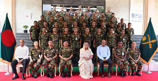 Prime minister Sheikh Hasina takes part in a photo session with army officials after inaugurating Army Headquarters Selection Board-2018 in Dhaka on Sunday. Photo: PID