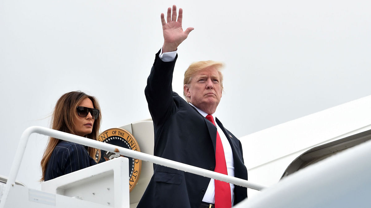 US president Donald Trump and first lady Melania Trump board Air Force One at Morristown Airport in Morristown, New Jersey, on 22 July. Photo: AFP