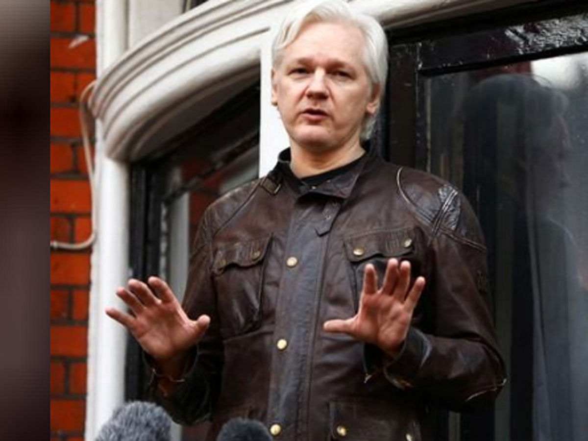WikiLeaks founder Julian Assange is seen on the balcony of the Ecuadorian embassy in London, on 19 May 2017. Reuters