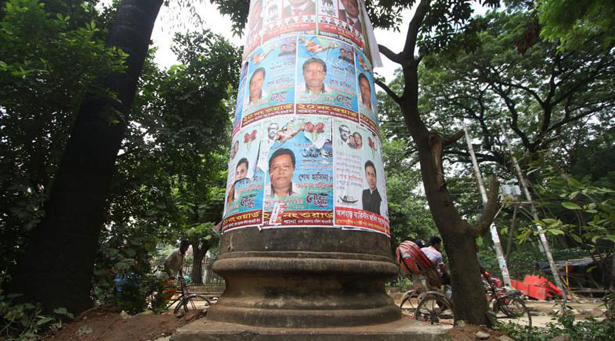 Posters of political parties have almost enveloped the historic Mir Jumla gate at Doel Chattar, Dhaka. The Rajdhani Unnayan Kartripakkha declared the gate, built by the then subedar Mir Jumla for the demarcation of Dhaka in 1660-1663, as a national heritage. The photo was taken by Abdus Salam on 22 July.