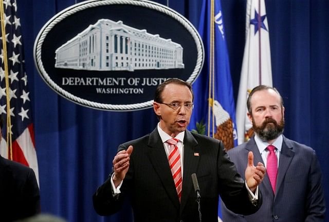 Deputy US attorney general Rod Rosenstein announces grand jury indictments of 12 Russian intelligence officers in special counsel Robert Mueller`s Russia investigation as he appears with Principal Associate Deputy Attorney General Ed O’Callaghan during a news conference at the justice department in Washington, DC, US, 13 July 2018. Photo: Reuters