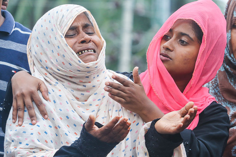 Students demonstrate against attacks, filing cases and arrests of quota reform movement activists. Mother of one of the quota reform movement leaders, Rashed Khan, who is now in police custody, breaks down in tears for his release in front of Raju Memorial Sculpture, Dhaka University on 22 July. Photo: Saiful Islam