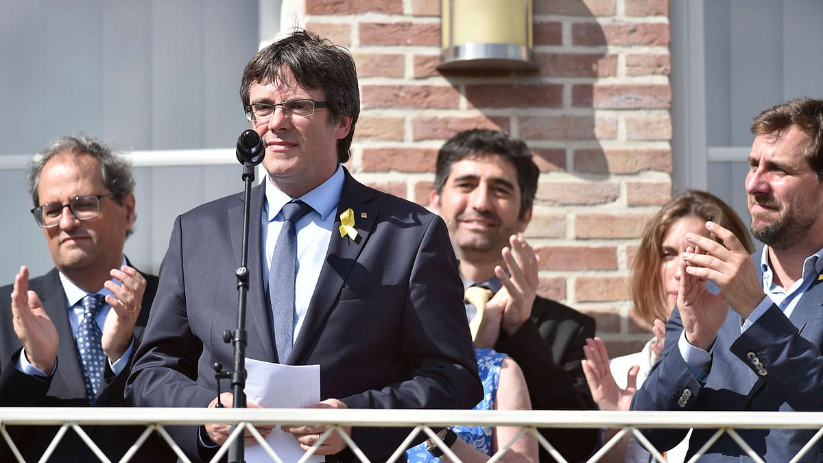 Former Catalan leader Carles Puigdemont delivers a speech as he attends a ceremony in Belgium’s Waterloo on 28 July, 2018. Photo: Reuters