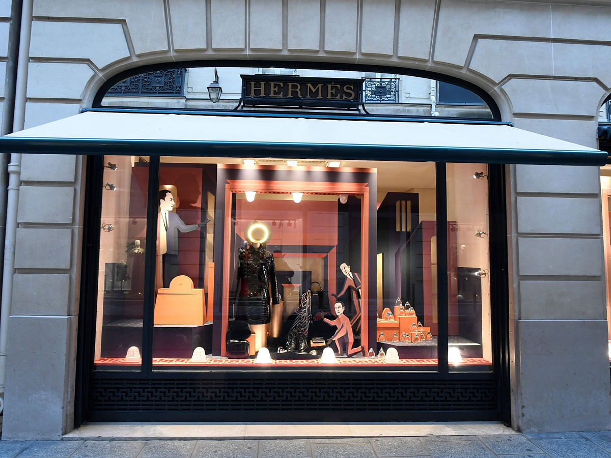 This file photo taken on 20 December 2017 shows a window display of French fashion luxury goods house Hermes in in Paris. In May 2018 Hermes has opened its 34th US boutique in Palo Alto in the posh area of California. -- AFP