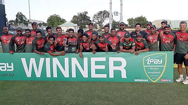 Bangladesh cricketers pose for photo session after winning winning the ODI Series against hosts West Indies on Saturday. Photo: Prothom Alo