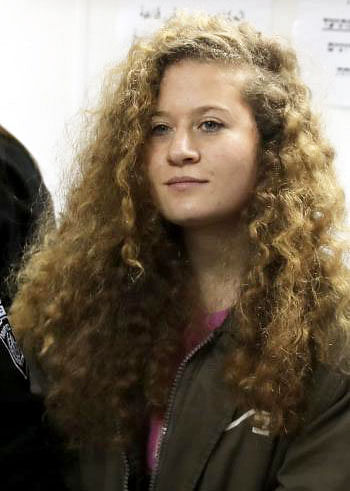 Palestinian teen Ahed Tamimi enters a military courtroom at Ofer Prison, near the West Bank city of Ramallah, 23 February 2018. Photo: Reuters