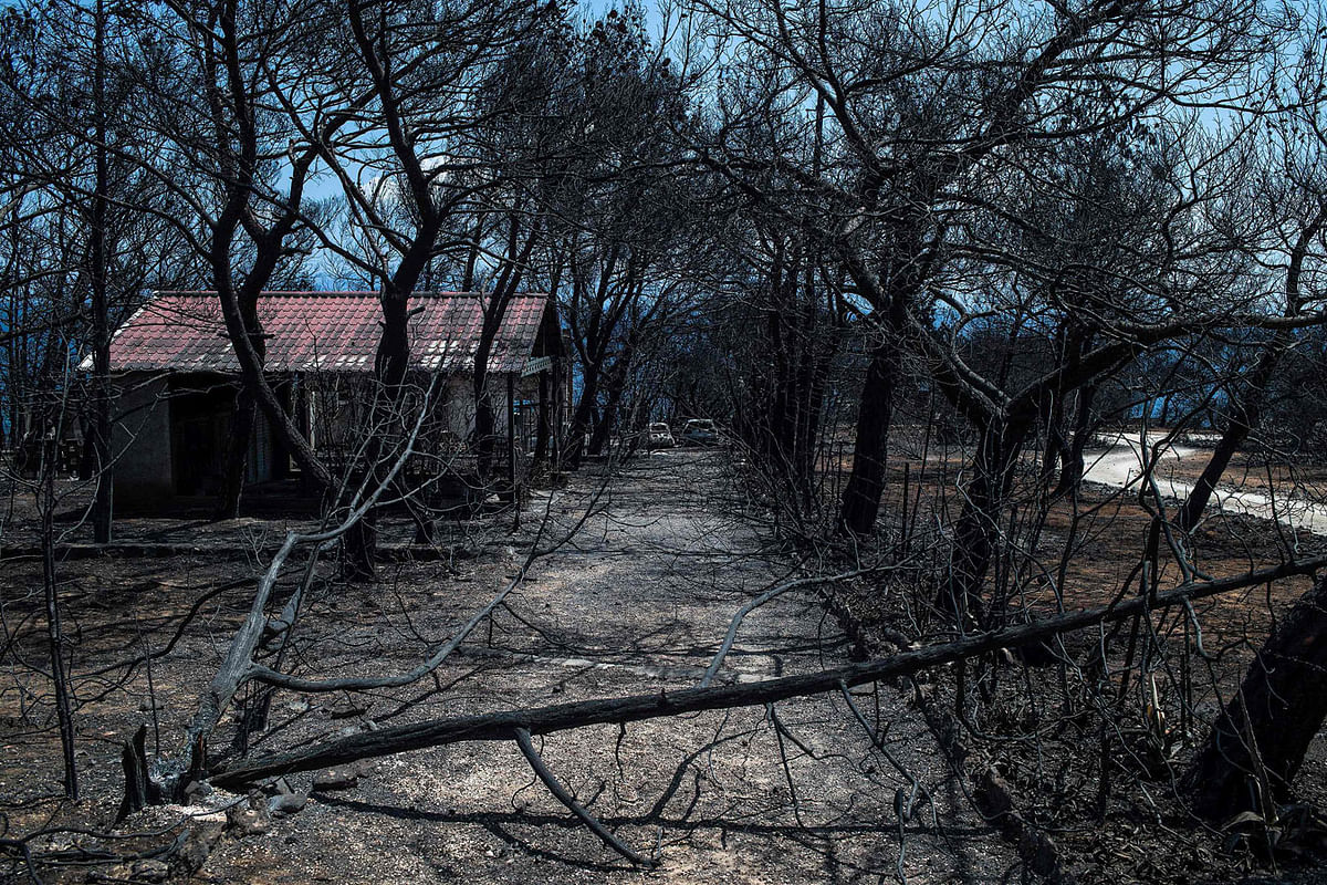 A picture taken on 28 July, 2018 shows the outside of a villa in Mati, near Athens, where three children and their grandparents were found dead after Greece`s worst wildfires killed 88, many of them children, on 23 July. Photo: AFP