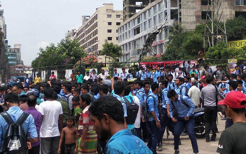 Agitating students block road at Mirpur-1, Dhaka on 31 July. They have been protesting against the death of two students crushed to death by a reckless bus at Airport Road, Dhaka Sunday. They also protest against the police action on the agitators. Photo: Iftekhar Mahmud