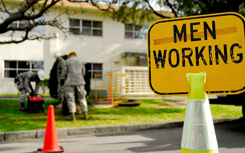 Road sign reads ‘MEN WORKING’. Photo: Collected