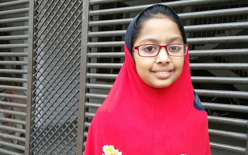 Zayeefa, 9, is happy because after repeatedly pestering her cousin, she finally was allowed to wear her butterfly scarf. The picture was taken from Rampura, Dhaka recently by Nusrat Nowrin