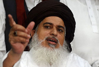 In this picture taken on 30 July 2018, head of Pakistan`s Sunni Muslim Tehreek-e-Labaik Pakistan (TLP) party, Khadim Hussain Rizvi, gestures as he speaks to media in Lahore. Islamic fundamentalist parties fielded more than 1,500 candidates in Pakistan`s provincial and national elections last week that were won by cricket hero turned politician Imran Khan.