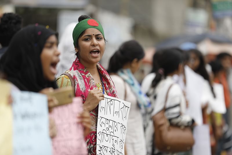 The students take to the streets of Dhaka for the sixth consecutive day in Asad Gate area of Mohammadpur on Friday morning. Photo: Dipu Malakar