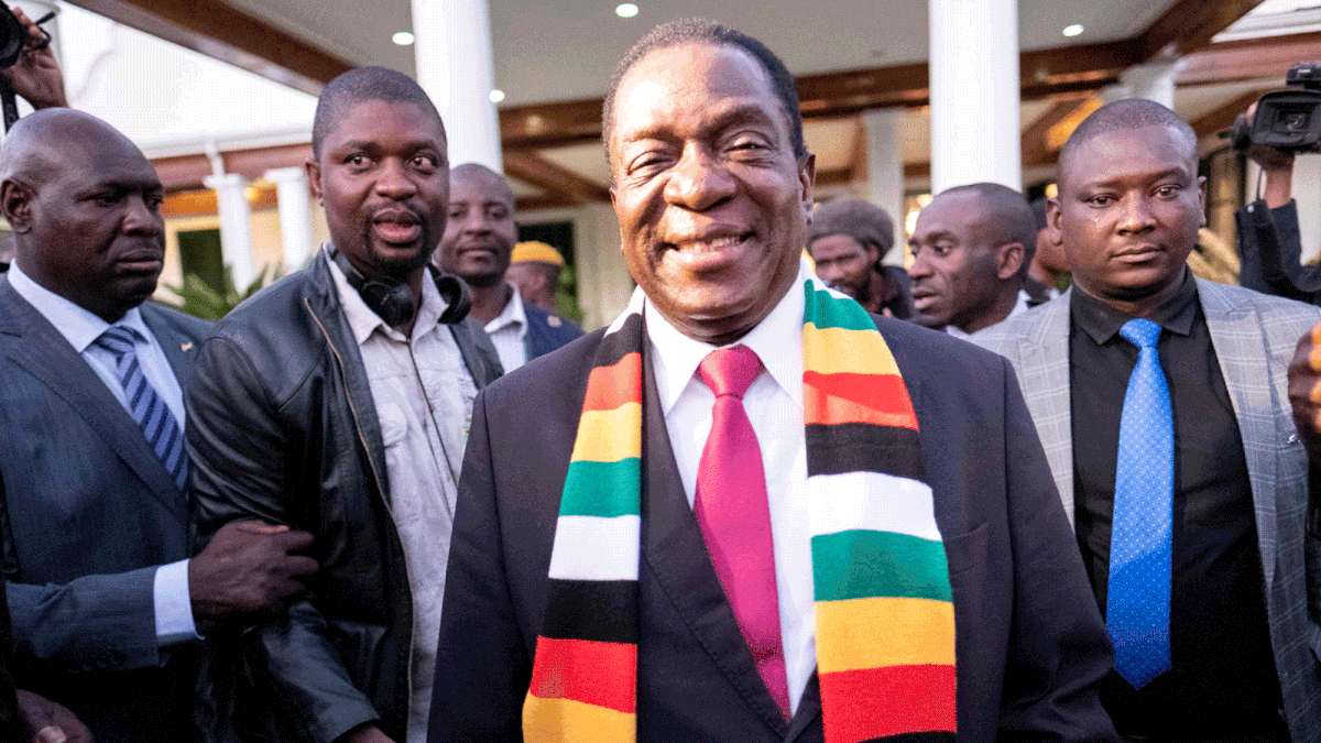 Zimbabwe president Emmerson Mnangagwa (C) is photographed at The State House in Harare on 3 August, 2018, at the end of a press conference. Photo: AFP