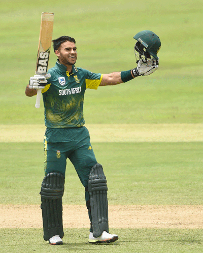 South Africa`s Reeza Hendricks celebrates after scoring 100 runs during the third One Day International (ODI) cricket match between Sri Lanka and South Africa at the Pallekele International Cricket Stadium in Pallekele on 5 August 2018. Photo: AFP