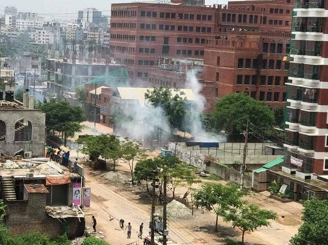 Police fire teargas shells on the demonstrating students of East West University. Photo: Collected