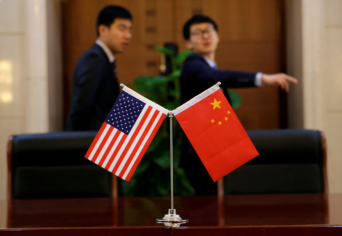 Chinese and US flags are set up for a signing ceremony during a visit by US secretary of transportation Elaine Chao at China`s Ministry of Transport in Beijing, China on 27 April. Photo: Reuters