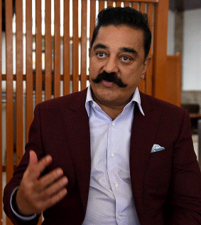In this photograph taken on 31 July 2018 Indian Bollywood film actor, director, screenwriter, and producer Kamal Haasan speaks during an interview with AFP for the promotion of his upcoming Hindi and Tamil film `Vishwaroopam 2` in Mumbai. Indian movie star Kamal Haasan, whose latest film releases 10 August, enjoys causing a stir as an actor and now he is looking to shake up Indian politics as well. Photo : AFP