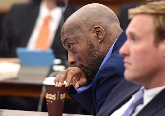 In this file photo taken on 9 July 2018 plaintiff Dewayne Johnson (L) listens during the Monsanto trial in San Francisco, California. Cancer-stricken Dewayne Johnson vowed to fight to his death in a David versus Goliath court battle against agrochemical giant Monsanto, whose weed killer he blames for robbing him of his future. Photo: AFP