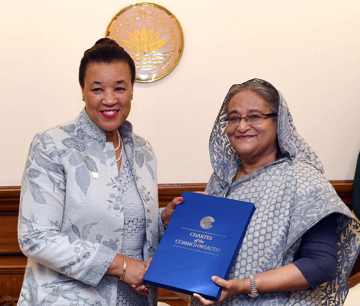 Commonwealth secretary general Patricia Scotland hands over Charter of the Commonwealth to prime minister Sheikh Hasina at thelatter’s office in Dhaka on Thursday. Photo: PID