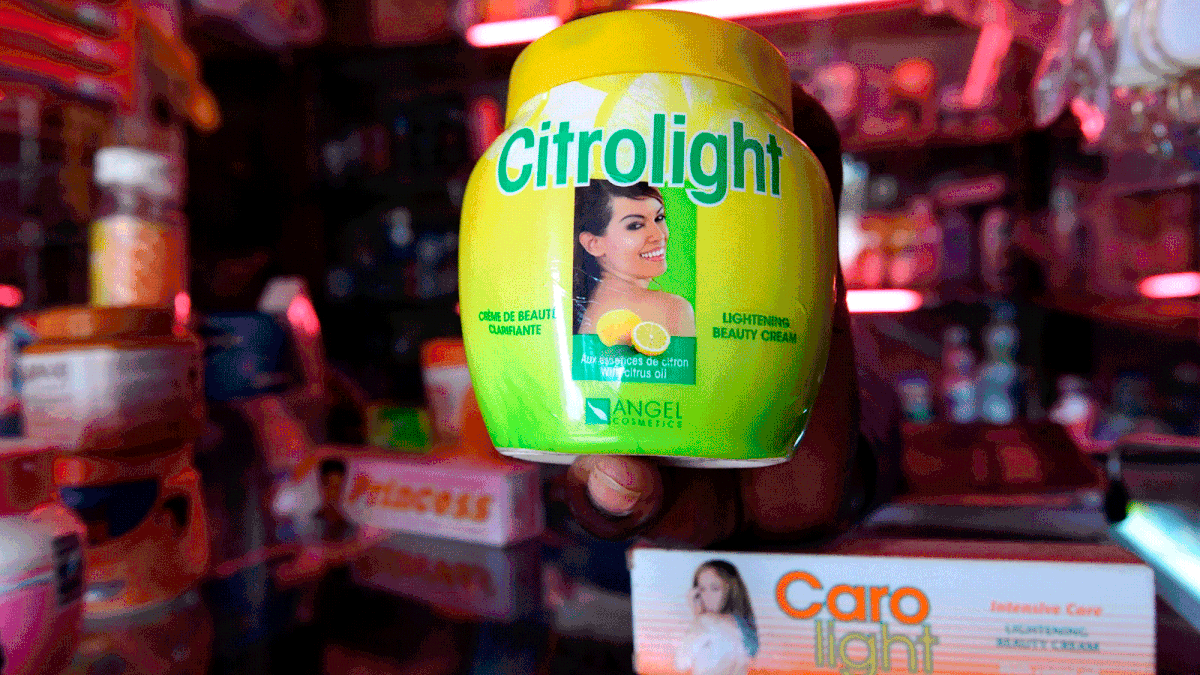 A beautician displays products used for skin lightening at a beauty shop, in Nairobi, on 6 July 2018. Photo: AFP