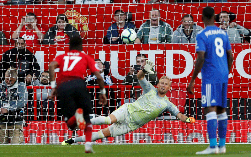 Manchester United’s Paul Pogba scores their first goal from the penalty spot past Leicester City’s Kasper Schmeichel in a Premier League match at Old Trafford, Manchester, Britain on 10 August 2018. Photo: Reuters