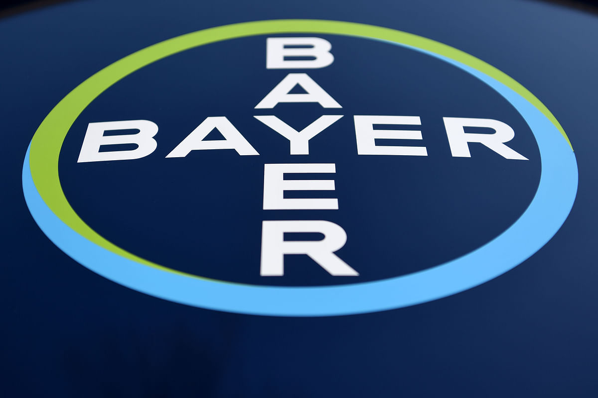 In this file photo taken on 28 February 2018 the logo of German chemicals giant Bayer is pictured during the company`s annual results press conference on 28 February 2018 in Leverkusen. A California jury on 10 August 2018 ordered the US agrochemicals giant -- which was taken over by Germany`s Bayer in June -- to pay nearly $290 million in compensation to a groundskeeper diagnosed with cancer after he repeatedly used Monsanto`s weed killer, Roundup. The lawsuit built on 2015 findings by the International Agency for Research on Cancer, part of the UN World Health Organisation, which classified Roundup`s main ingredient glyphosate as a probable carcinogen.