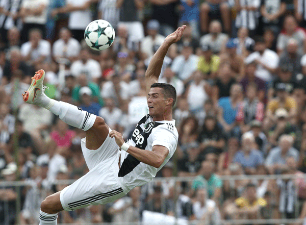 Juventus` forward from Portugal Cristiano Ronaldo kicks the ball during the friendly football match between Juventus A and Juventus B at Villar Perosa, on 12 August 2018 at Villar Perosa. AFP