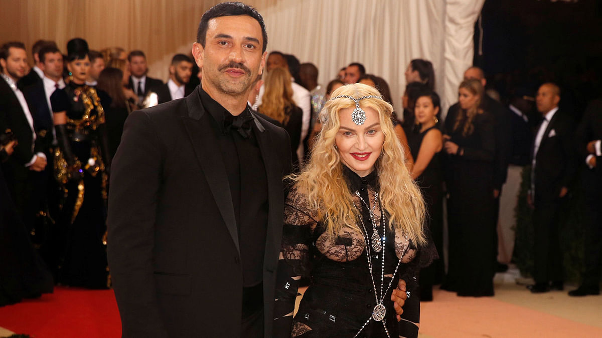 Singer Madonna arrives with fashion designer Riccardo Tisci at the Metropolitan Museum of Art Costume Institute Gala (Met Gala) to celebrate the opening of “Manus x Machina: Fashion in an Age of Technology” in the Manhattan borough of New York, US on 2 May 2016. Photo: Reuters