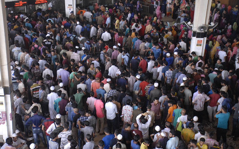 Hundreds of homebound people gather in Kamalapur Railway Station, Dhaka to collect tickets on 12 August. Photo: Hassan Raja
