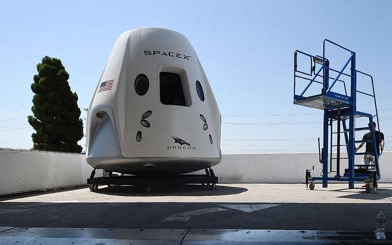 A mock up of the Crew Dragon spacecraft is displayed during a media tour of SpaceX headquarters and rocket factory on 13 August, 2018 in Hawthorne, California. Photo: AFP
