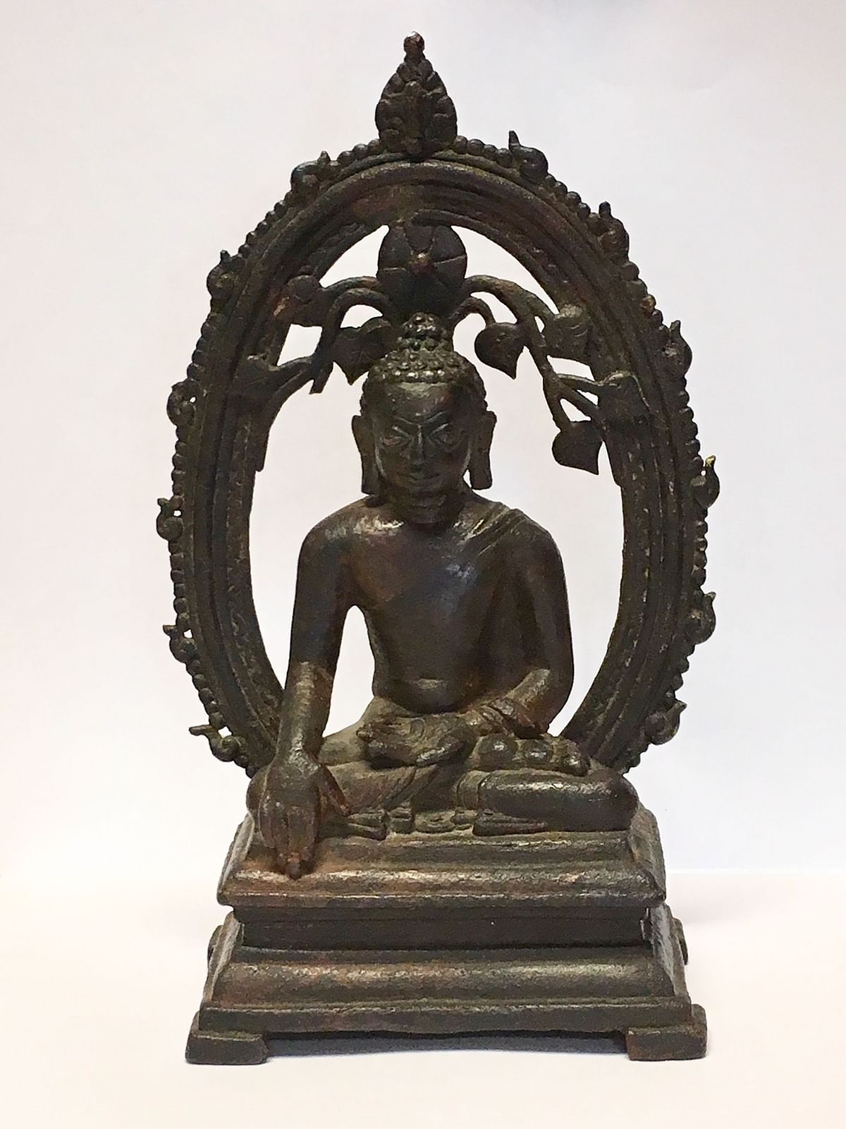 An undated handout picture released by the British Metropolitan Police Service (MPS) in London on 15 August 2018, shows a 12th century Buddha statue stolen from India 57 years ago that is to be returned to the Indian High Commissioner in London. Photo: AFP