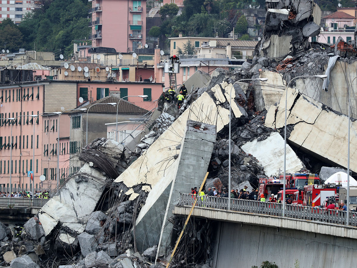 The collapsed Morandi Bridge is seen in the Italian port city of Genoa in this picture released by Italian firefighters on 14 August. Photo: Reuters