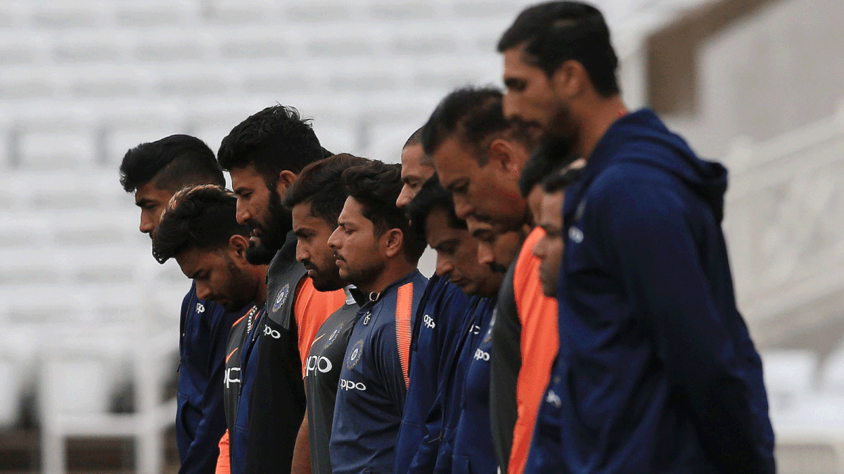 India cricket team players pay their respects to former captain Ajit Wadekar, who died on August 15, during a practice session. AFP