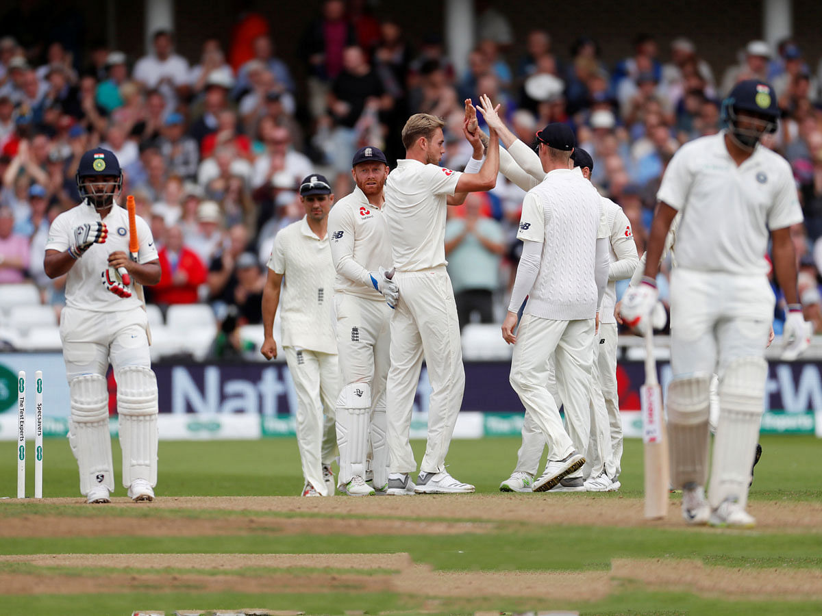 England`s Stuart Broad and team mates celebrate after getting wicket India`s debutant Rishabh Pant. Photo: Reuters