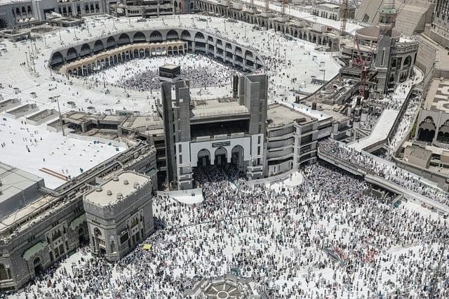 Muslim pilgrims walk out after the Friday prayer at the Grand mosque ahead of annual Hajj pilgrimage in the holy city of Mecca, Saudi Arabia on 17 August 2018. Photo: Reuters