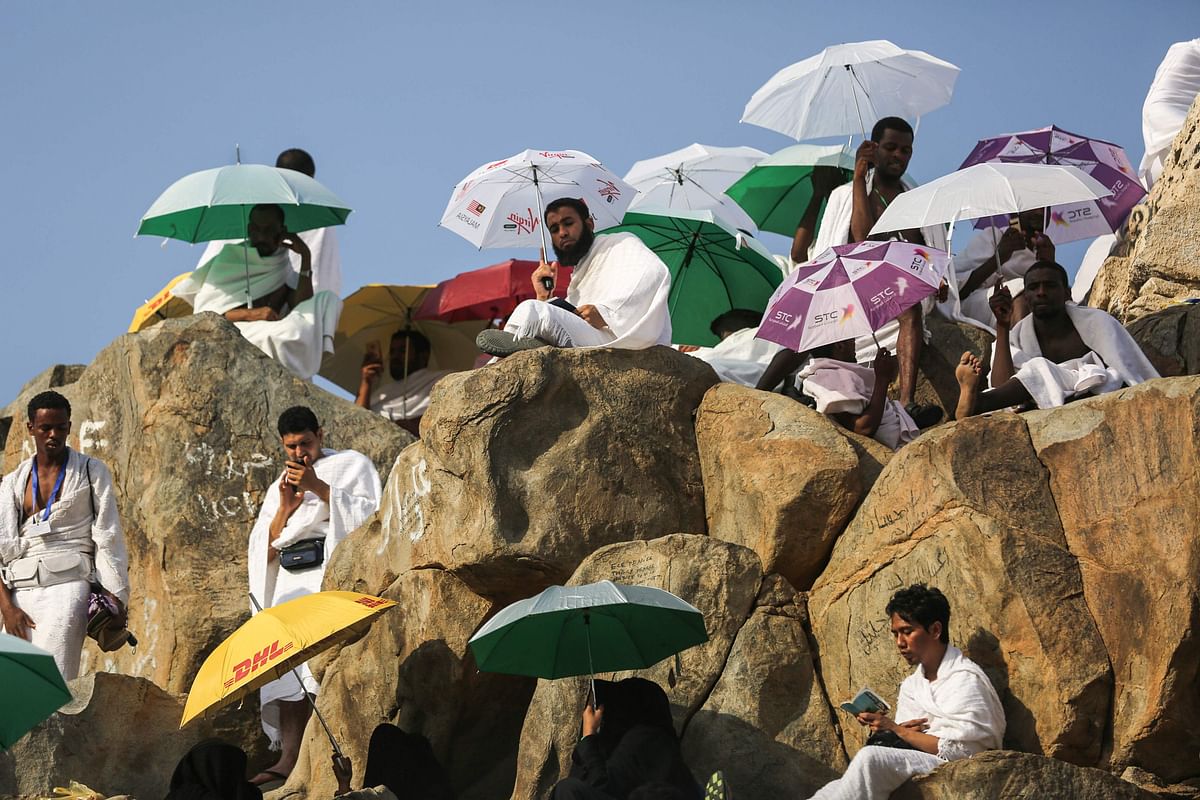 Muslim pilgrims gather on Mount Arafat, also known as Jabal al-Rahma (Mount of Mercy), southeast of the Saudi holy city of Makkah, on Arafat Day which is the climax of the hajj pilgrimage early on 20 August, 2018. Photo: AFP