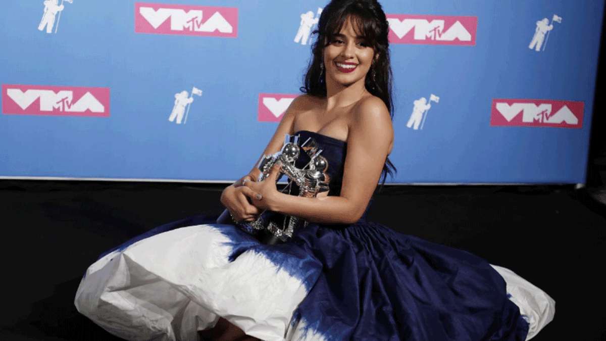 2018 MTV Video Music Awards - Photo Room - Radio City Music Hall, New York, US, 20 August 2018. - Camila Cabello poses backstage with her awards for Artist of the Year and Video of the Year for `Havana.` -- Reuters