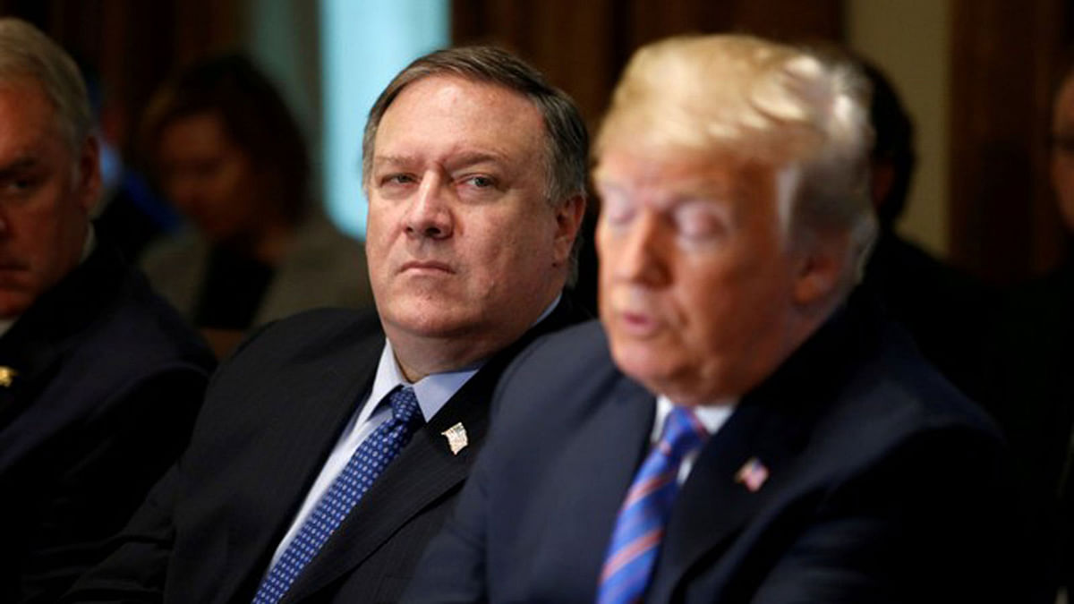 US secretary of state Mike Pompeo listens as US president Donald Trump speaks during a cabinet meeting at the White House in Washington, US on 18 July 2018. Photo: Reuters
