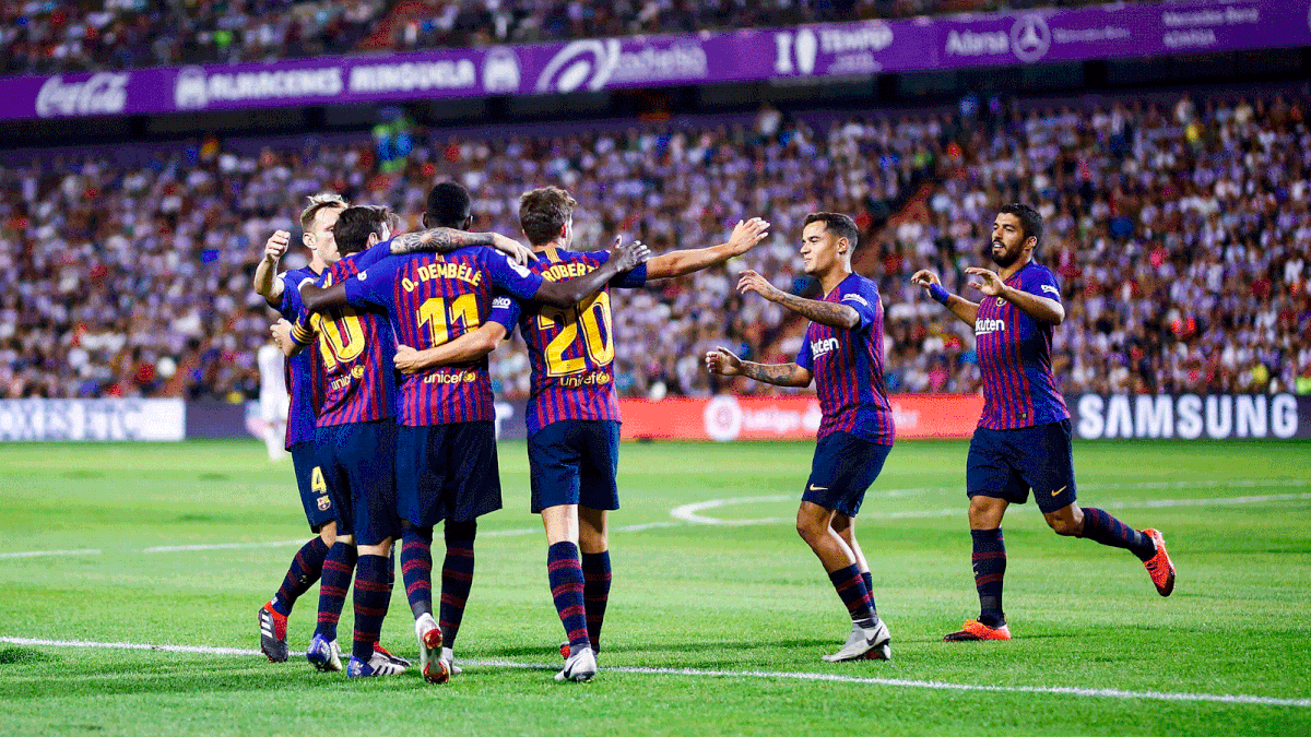 Barcelona`s French forward Ousmane Dembele (3L) celebrates a goal with teammates during the Spanish league football match between Real Valladolid and FC Barcelona at the Jose Zorrilla Stadium in Valladolid on 25 August 2018. Photo: AFP