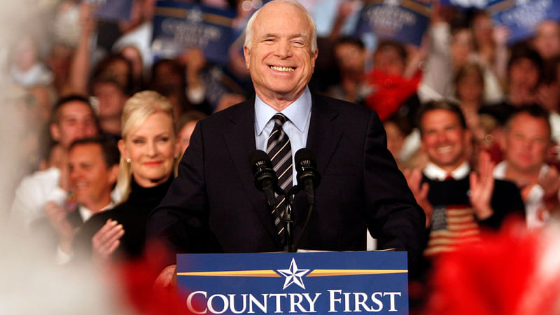 US Republican presidential nominee Senator John McCain (R-AZ) smiles as he speaks during a rally in La Crosse, Wisconsin on 10 October 2008. Reuters File Photo