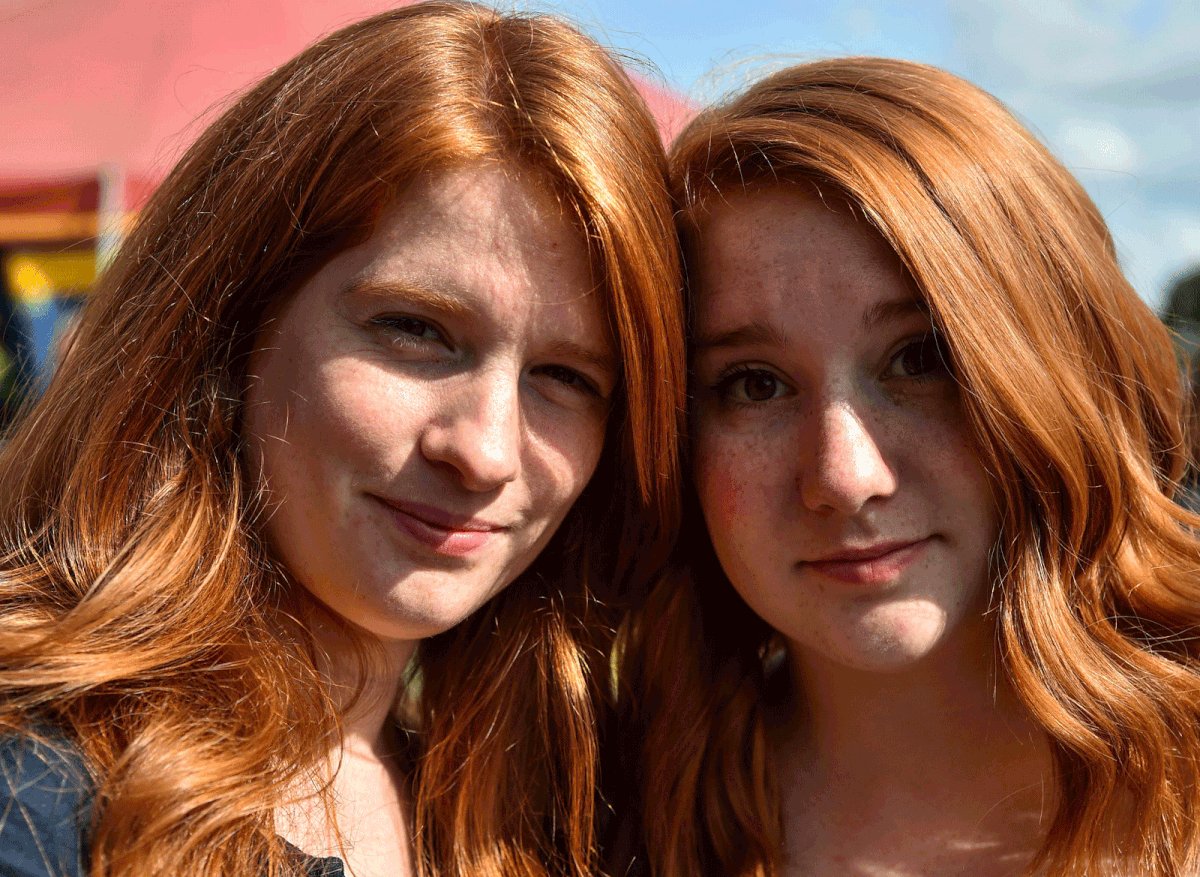 Celine and Deborah pose for a photograph during the “Red Love Festival,” the first festival dedicated to redheads, on 25 August in Chateaugiron, near Rennes, western France. Photo: AFP