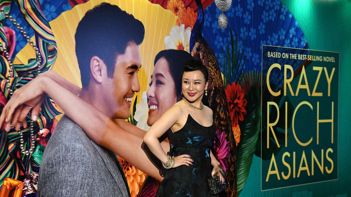 This photo taken on 21 August 2018 shows Chinese actress Jasmine Chen posing at the premier of the film `Crazy Rich Asians` at the Capitol Theatre in Singapore. AFP