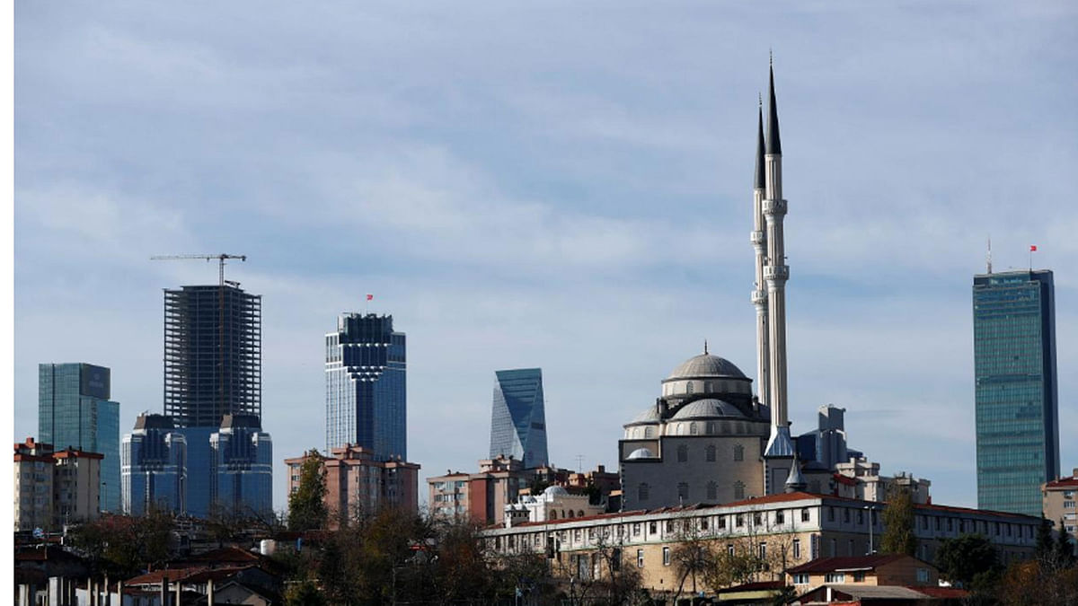 Business and financial district of Levent, which comprises of leading Turkish banks` and companies` headquarters, is seen behind a residential neighborhood in Istanbul, Turkey, on 30 November 2017. -- Reuters