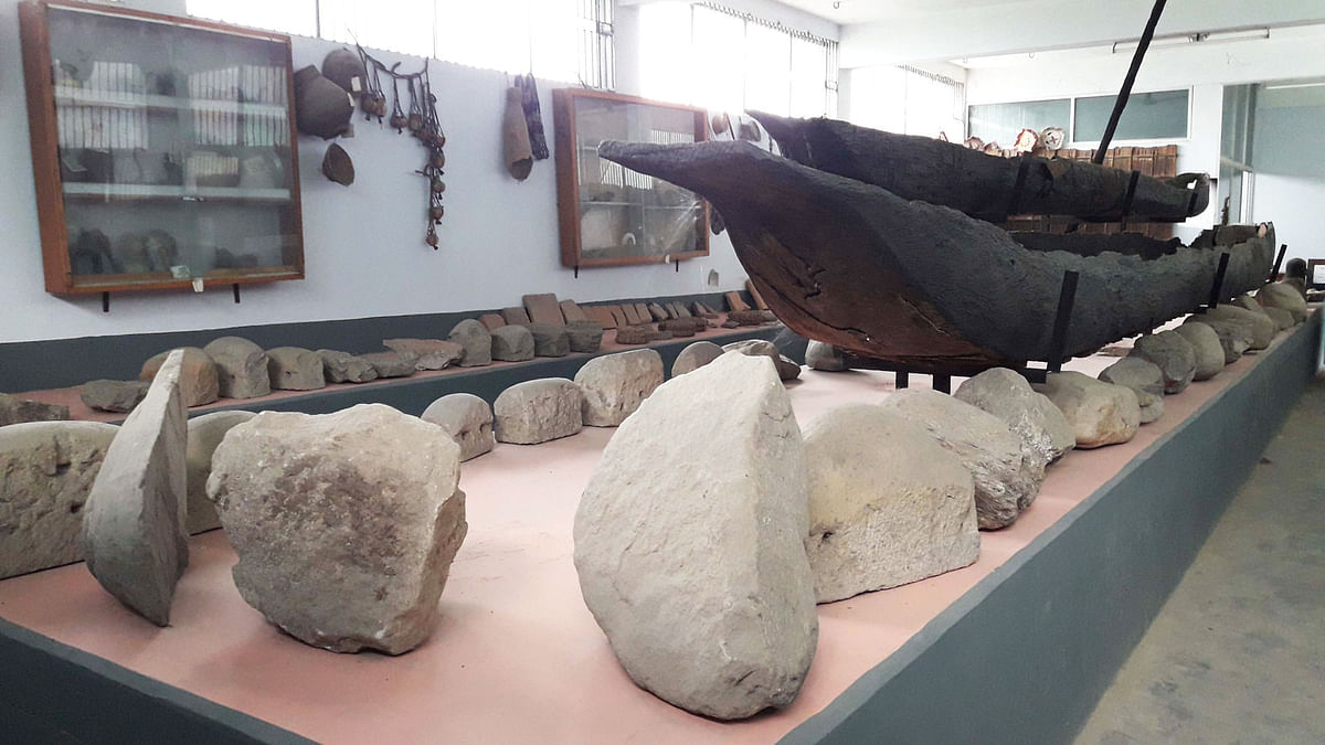 A collection of the rocks including a pair of 300-year-old boats at the Rocks Museum in Panchagarh Government Girls` College, Panchagarh. Photo: Prothom Alo