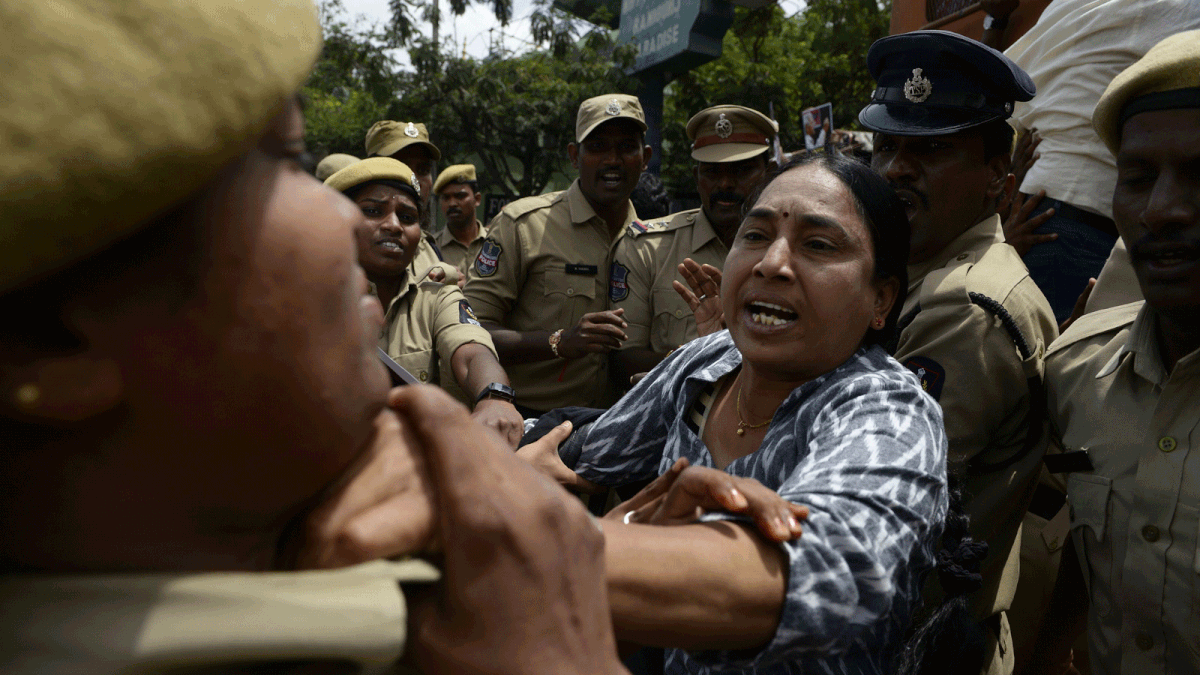 A Progressive Organisation for Women (POW) activist scuffles with police during a protest against the arrest of Indian poet and activist Varavara Rao in Hyderabad, on 29 August 2018. Photo: AFP