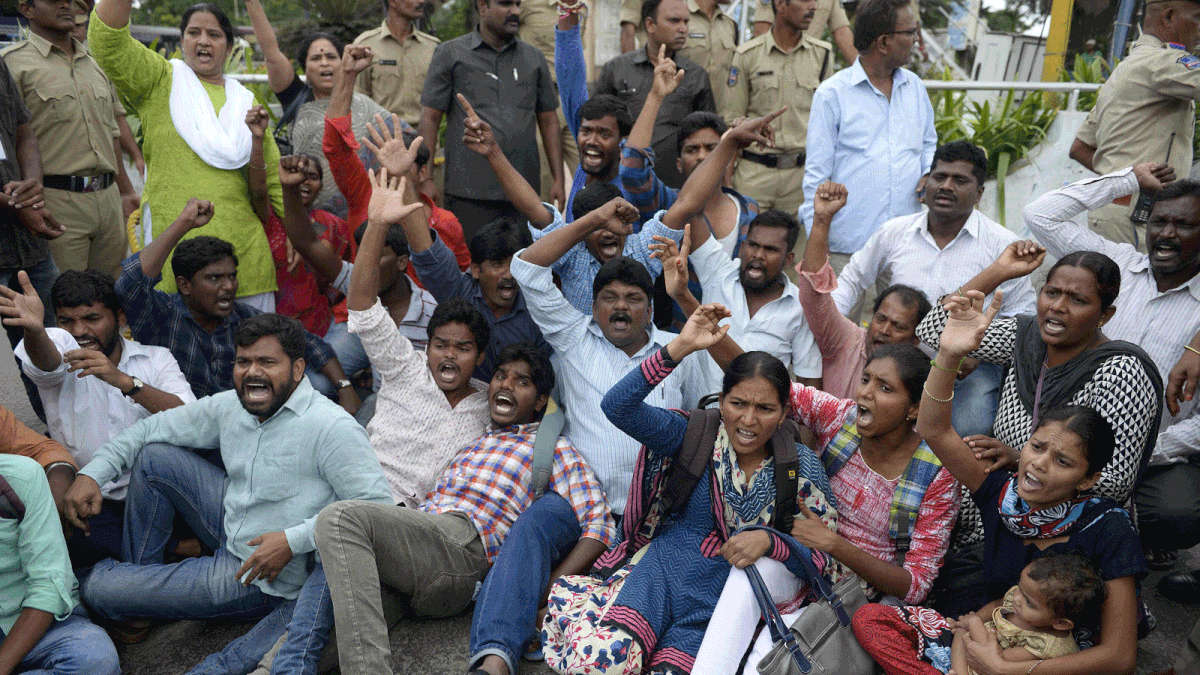 Indian activists of the Communist Party of India (Marxist-Leninist) New Democracy shout slogans during a protest against the arrest of poet and activist Varavara Rao in Hyderabad, on 29 August 2018. Photo: AFP