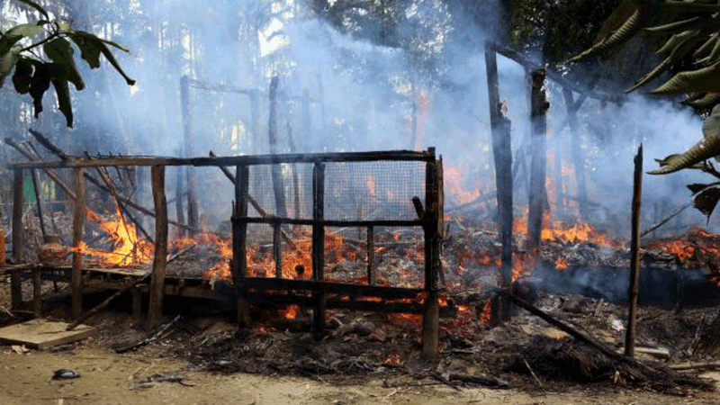 A house is seen on fire in Gawduthar village, Maungdaw township, in the north of Rakhine state, Myanmar 7 September, 2017. Photo: Reuters